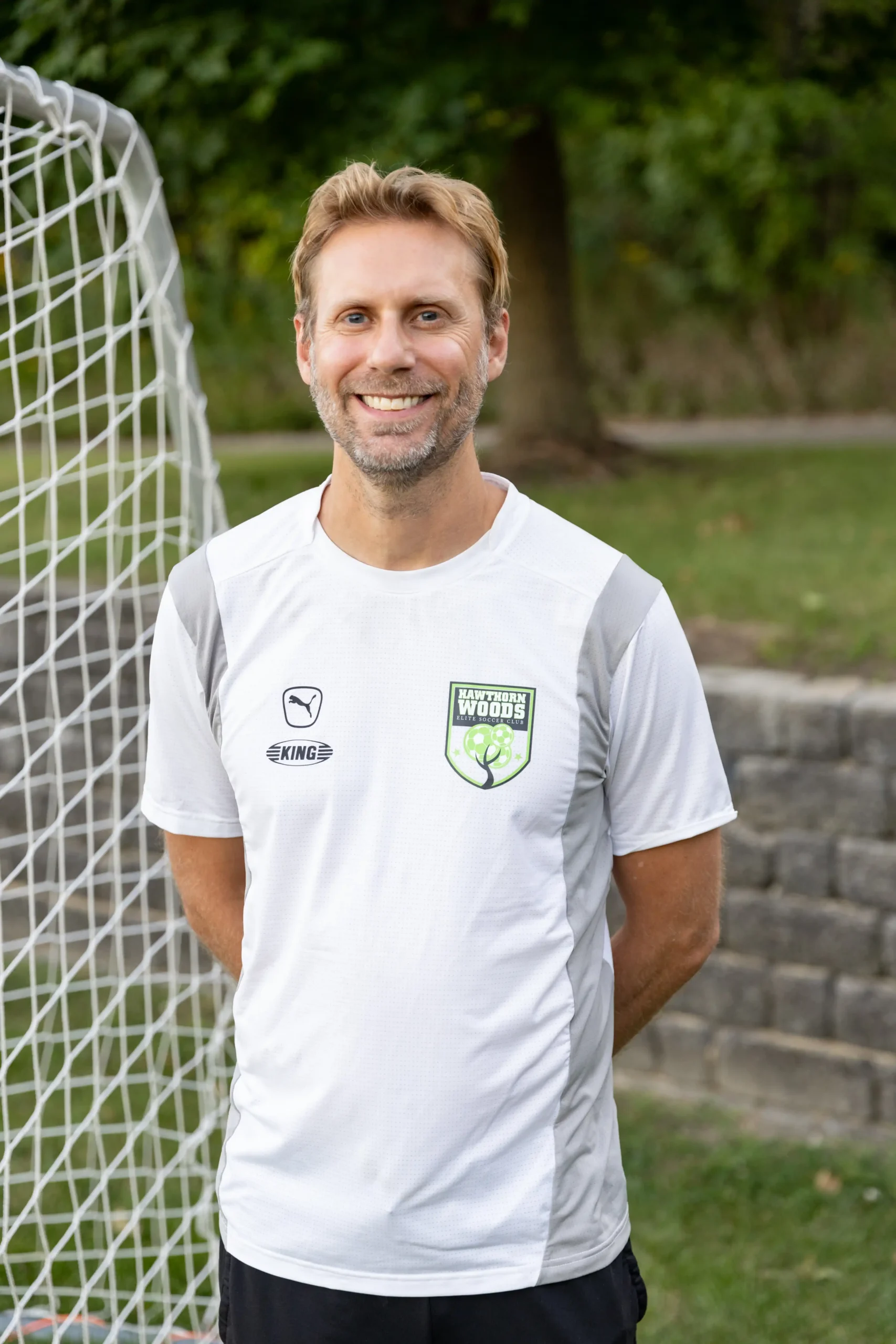 Coach Justin Woycke